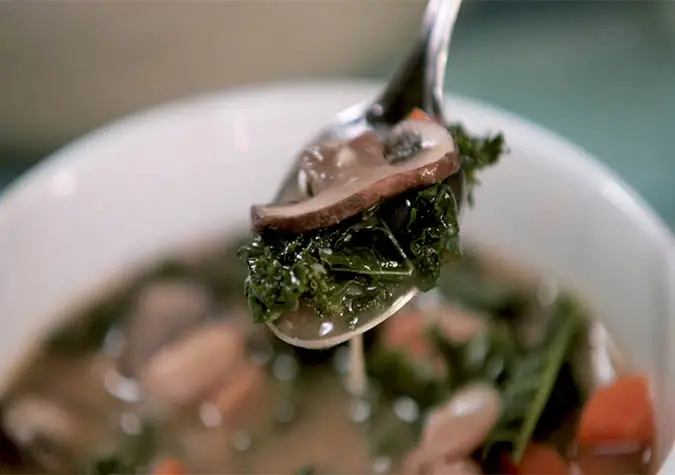 a spoon with a mushroom on it