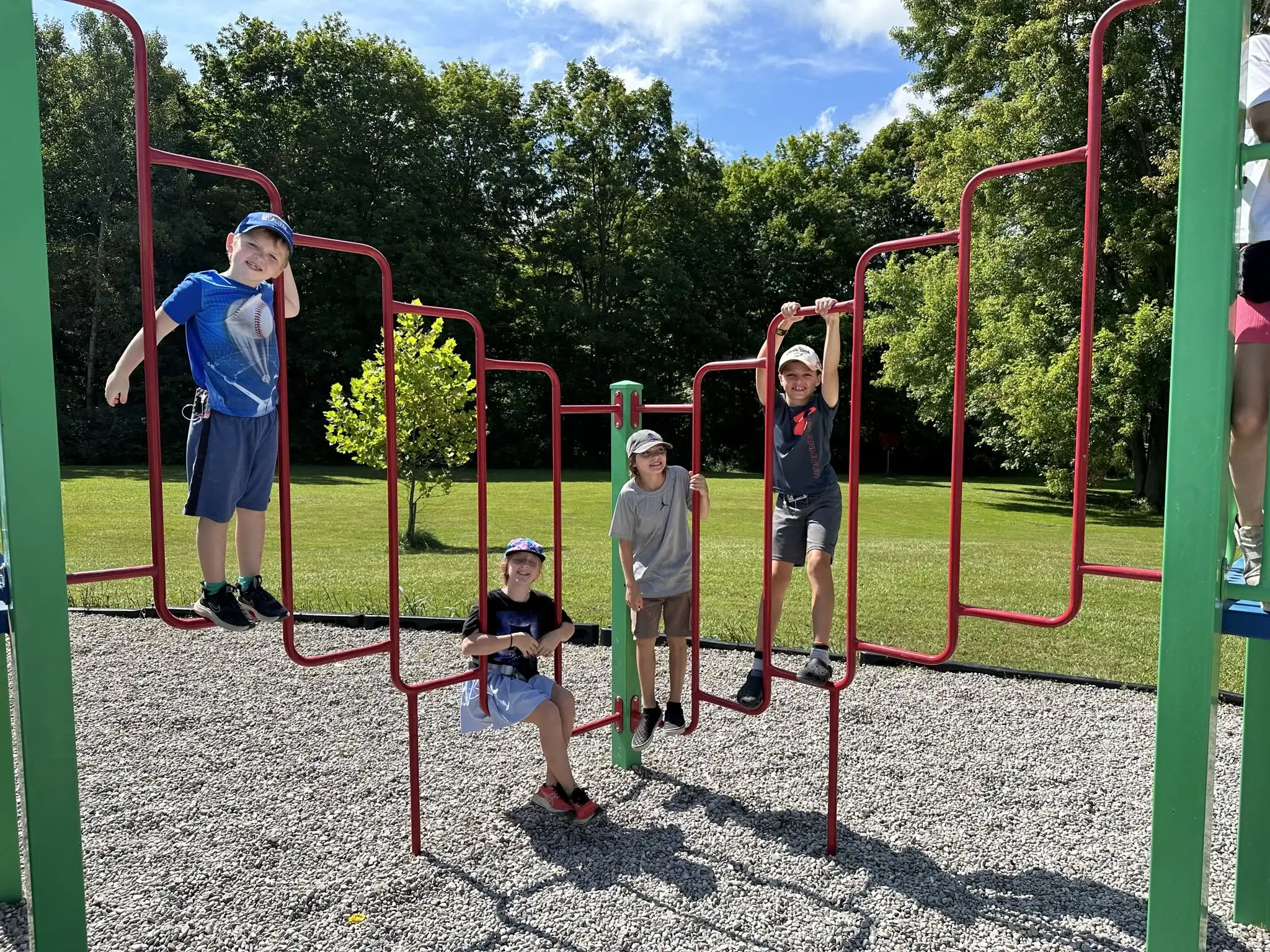 a group of kids playing on a playground