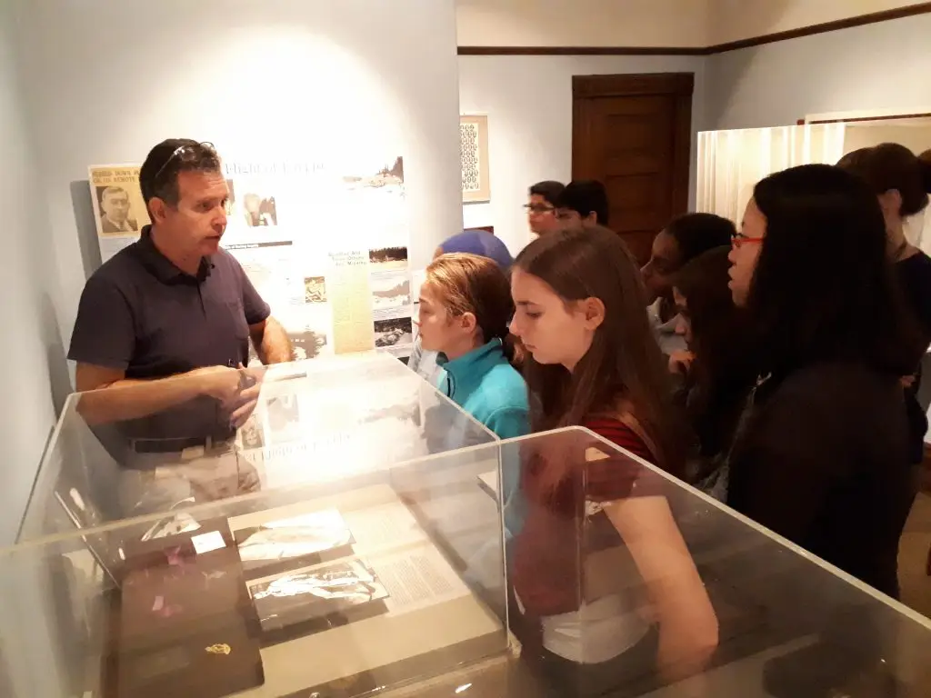 a group of people in a museum