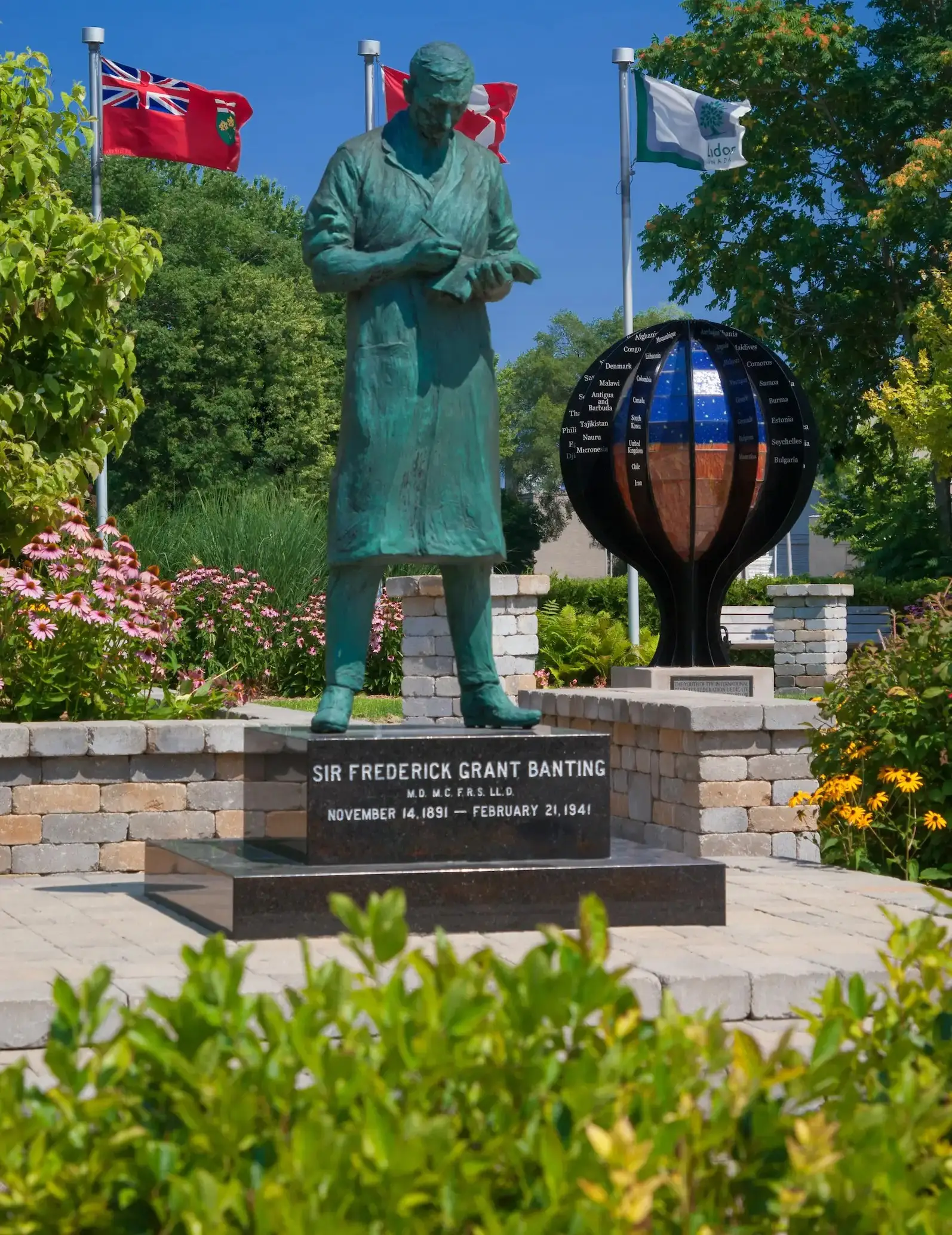 a statue of a man in a long coat