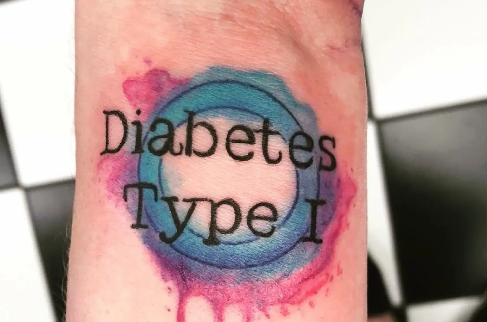 a tattoo on a wrist