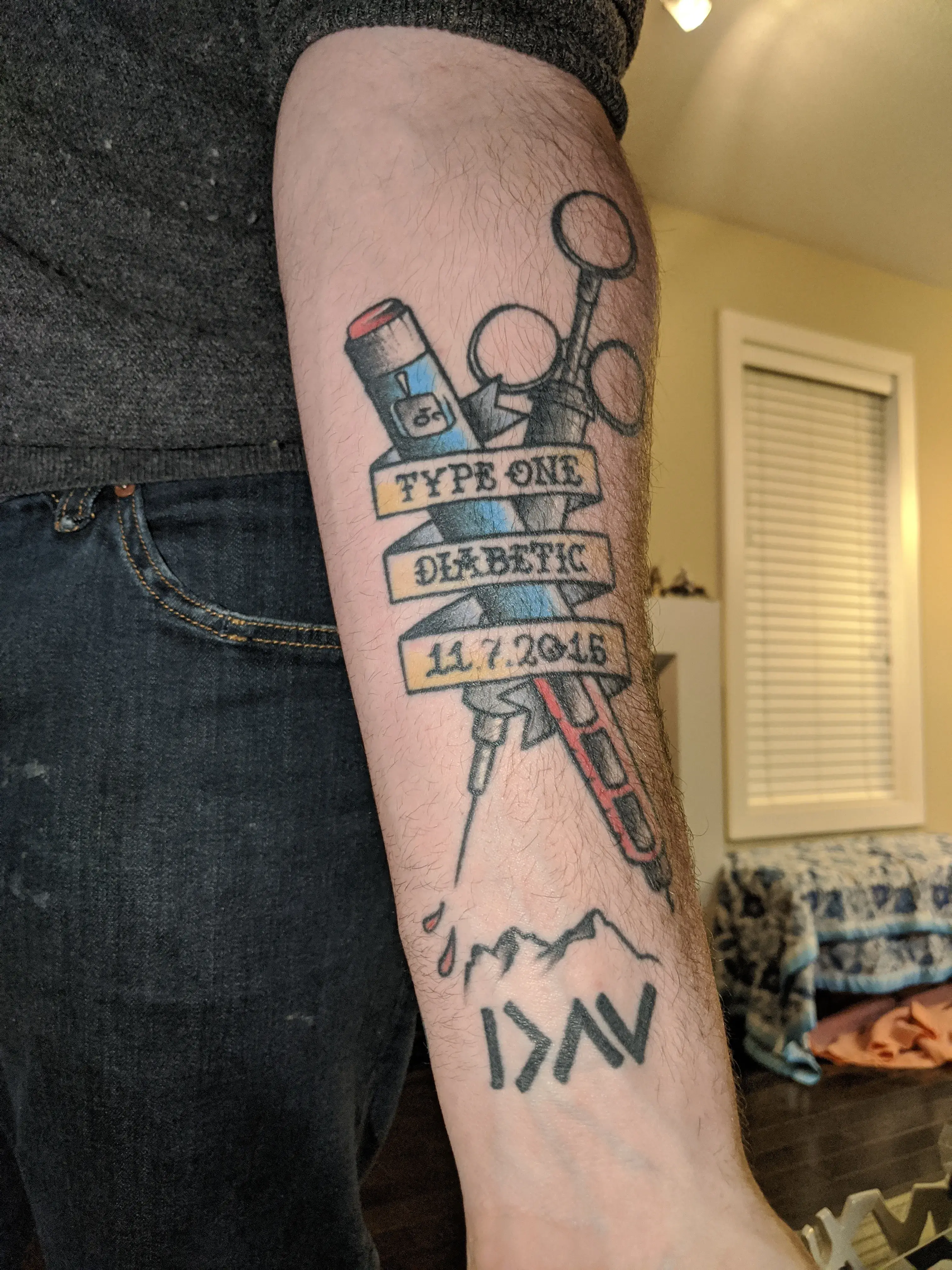 a person's arm with a tattoo