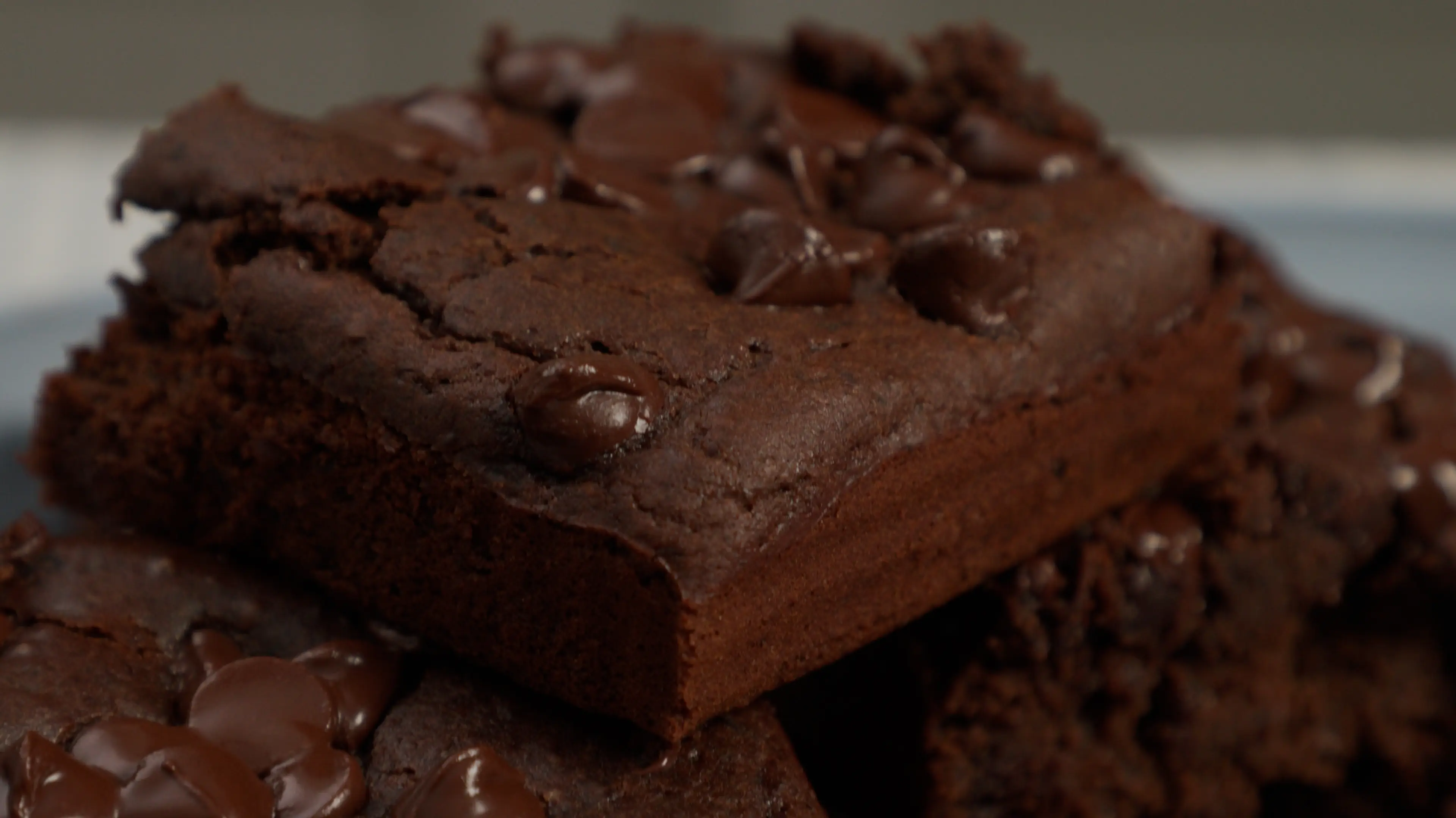 a stack of brownies with chocolate chips