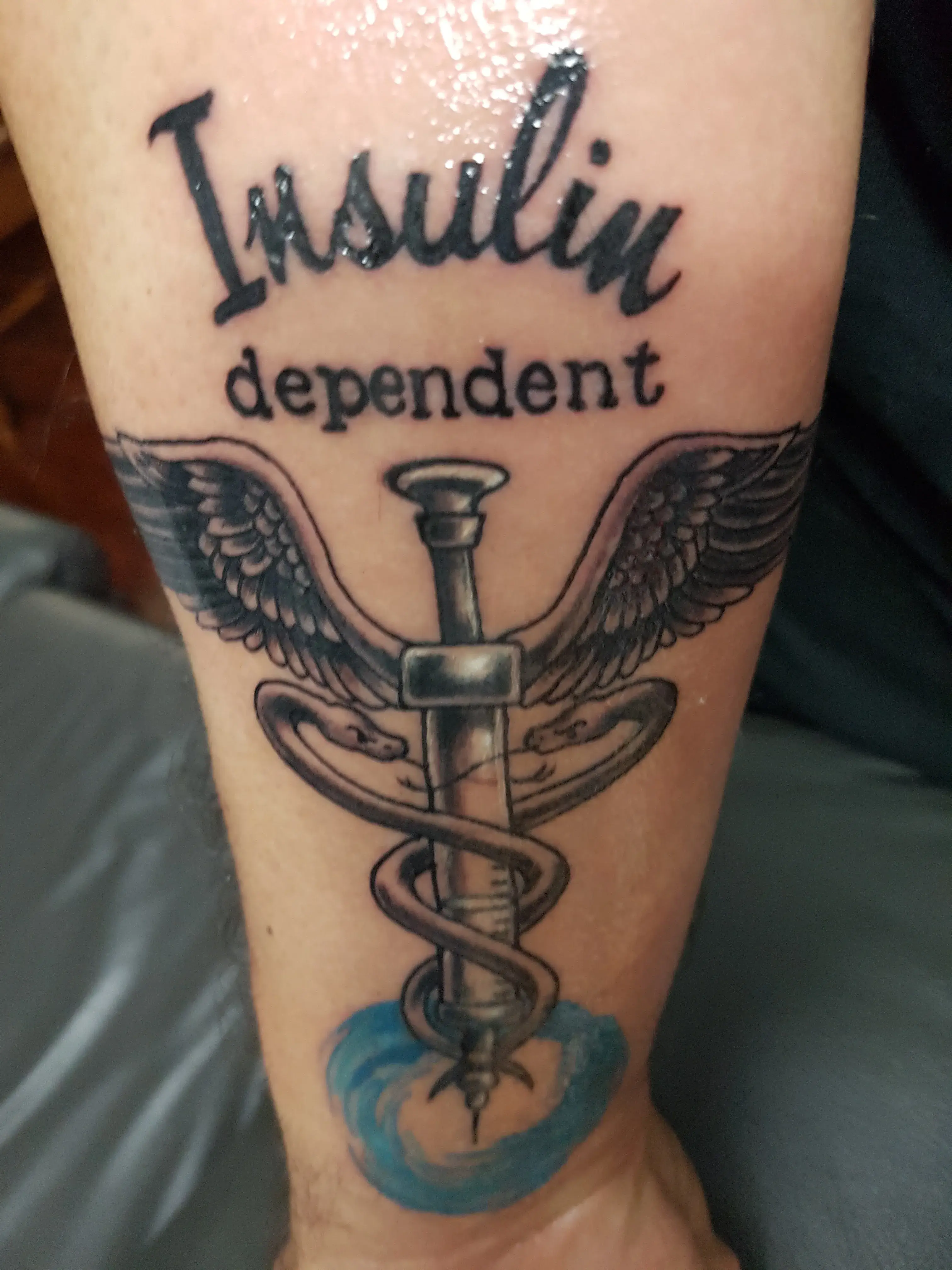 a tattoo on a person's arm