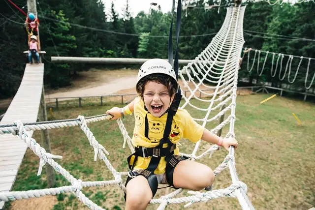 a child in a rope bridge