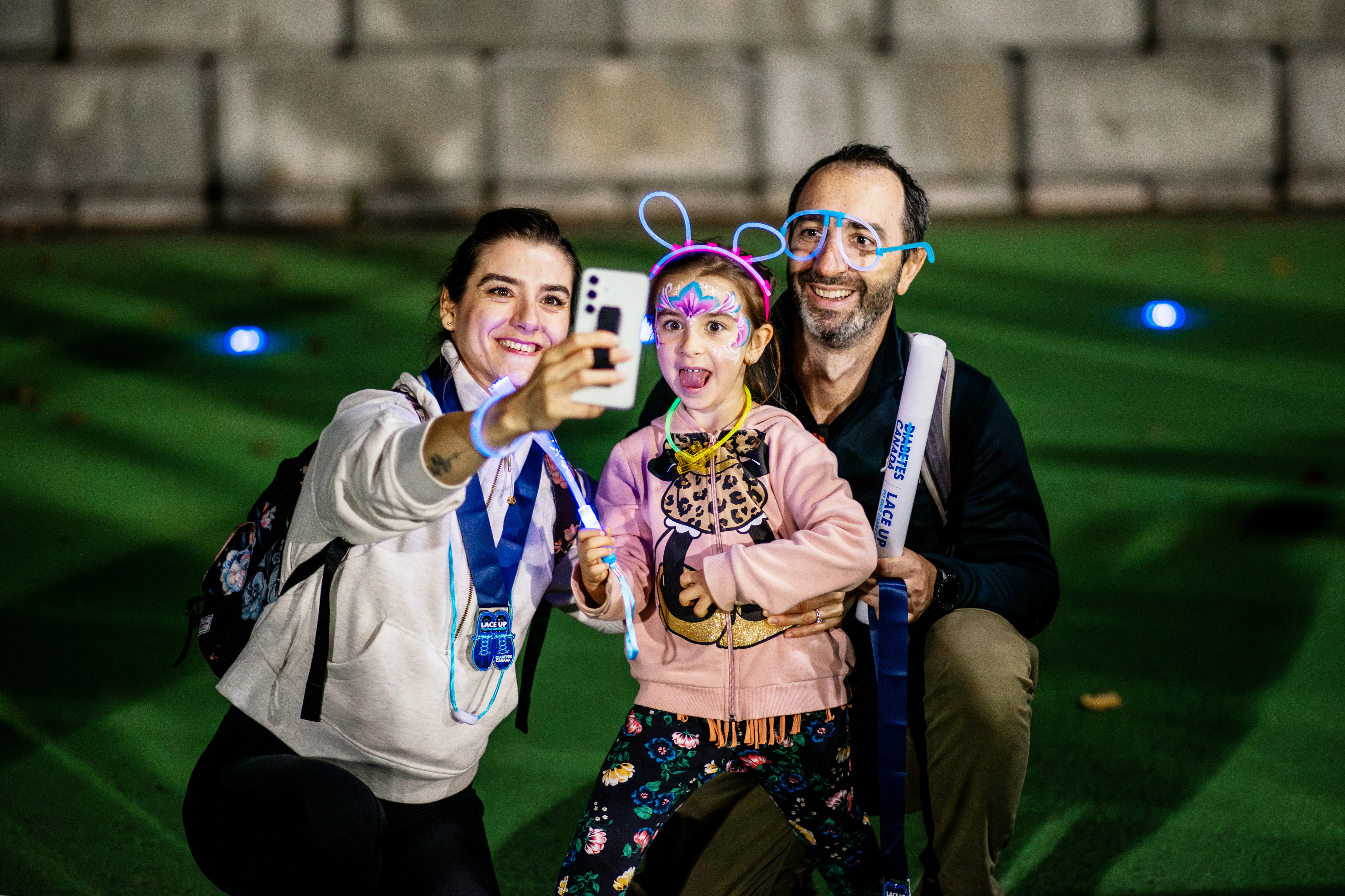 a group of people taking a selfie