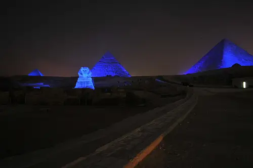 a road leading to a pyramid