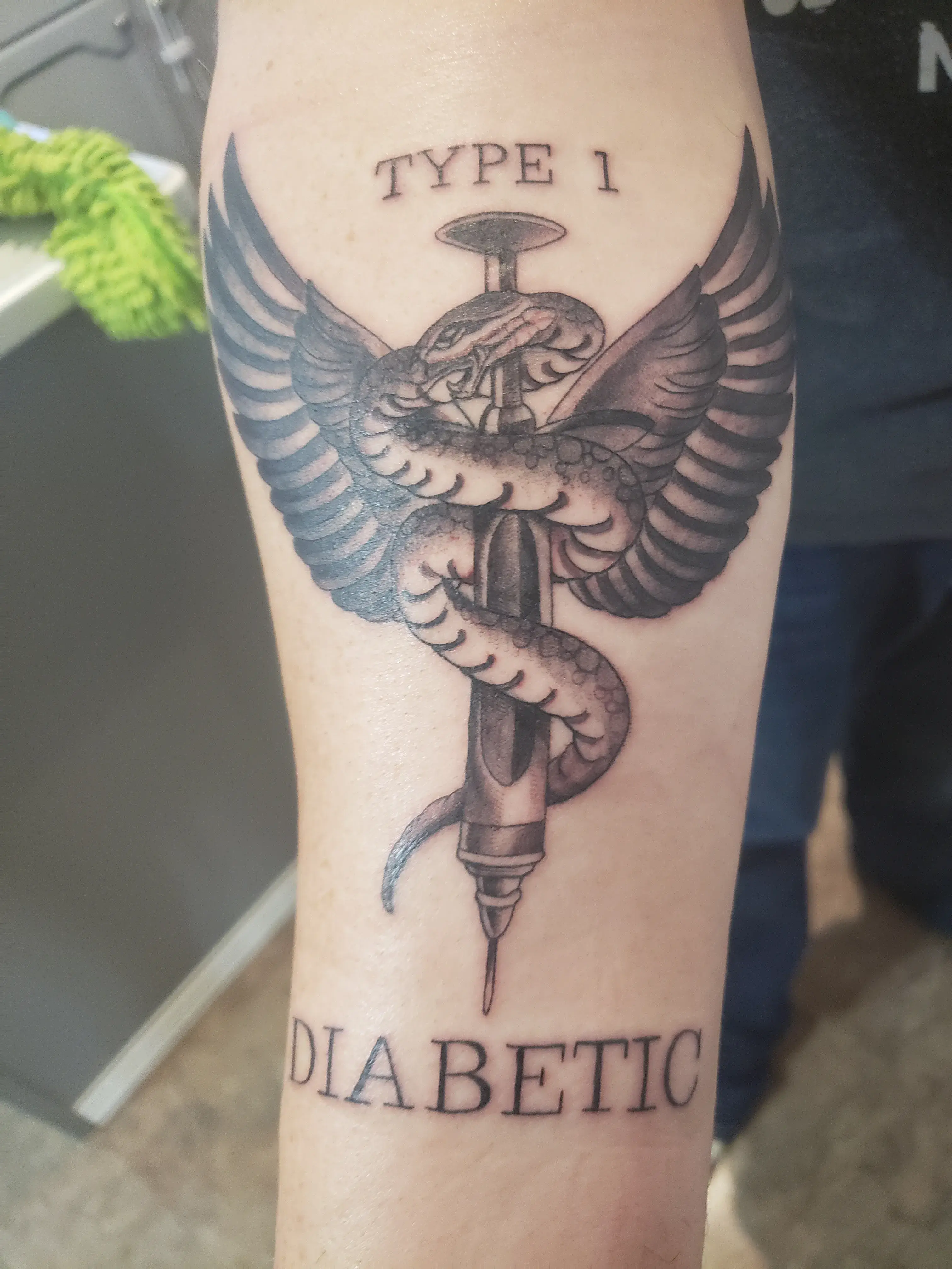 a tattoo on a person's arm