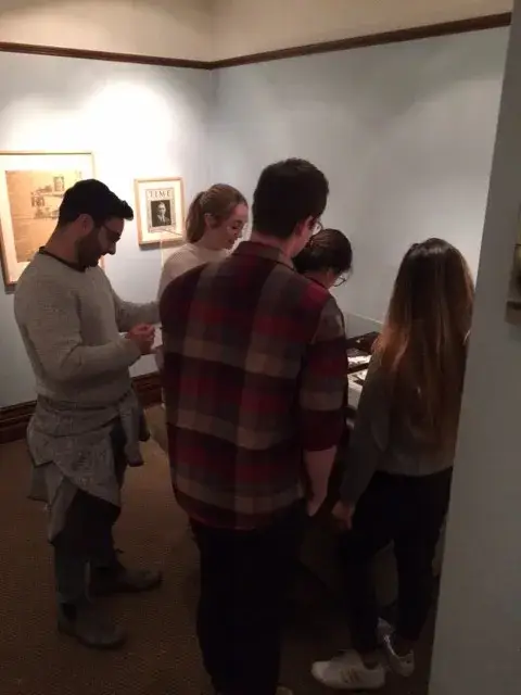 a group of people standing in a room