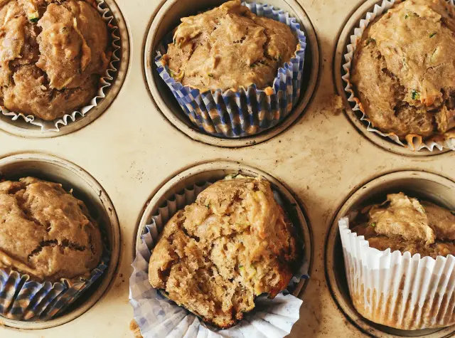 a group of muffins in a pan