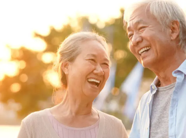 a man and woman laughing