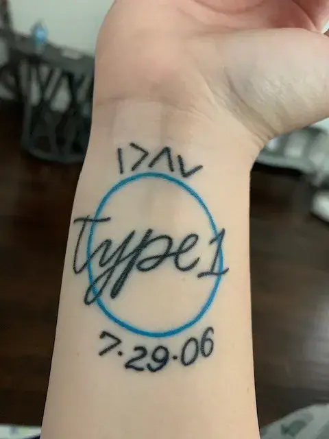 a tattoo on a wrist