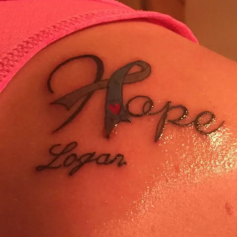 a tattoo on a person's shoulder