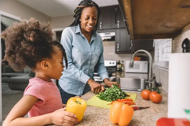 a-mother-and-child-chopping-veggies_small