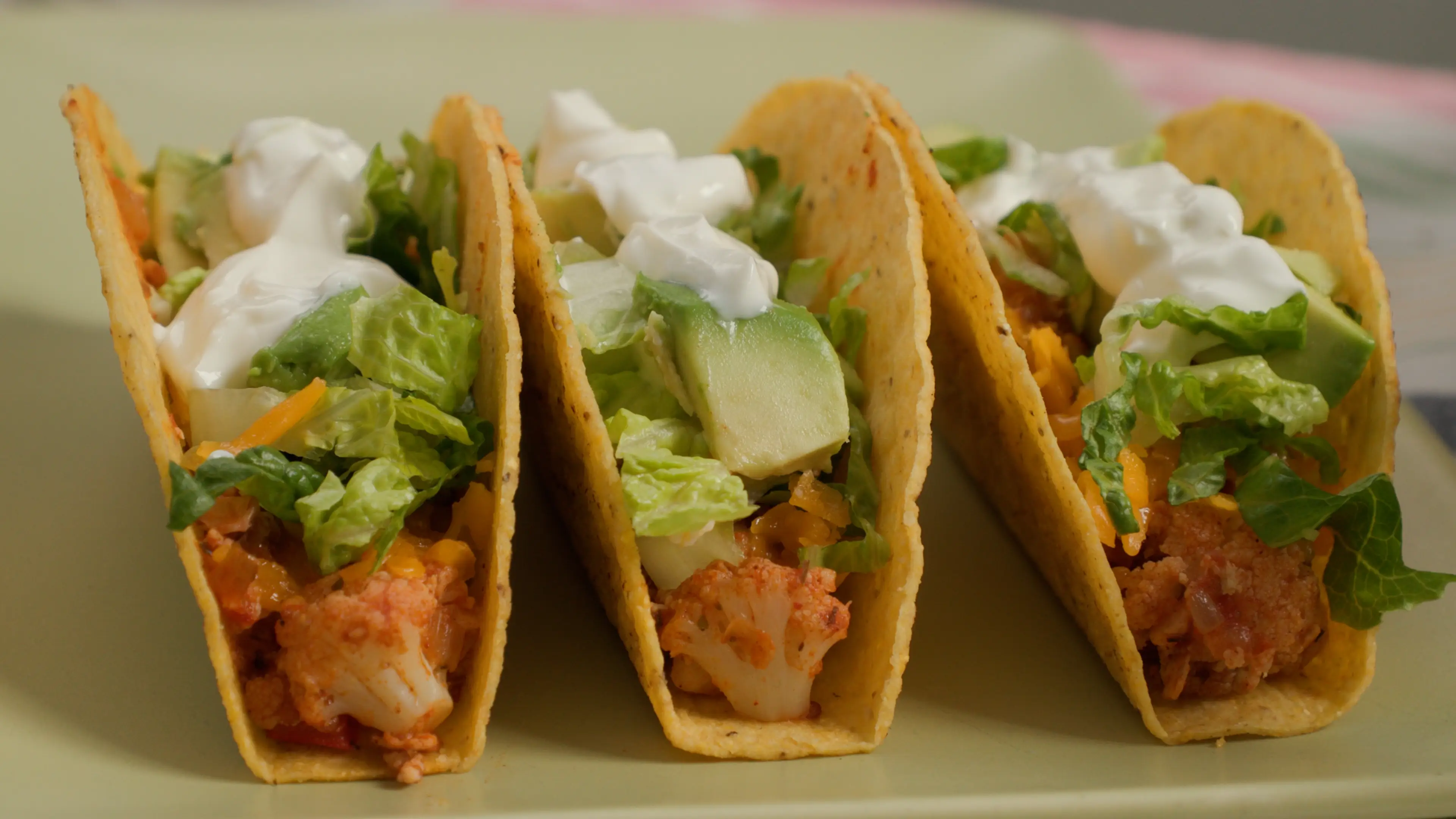 a group of tacos on a plate
