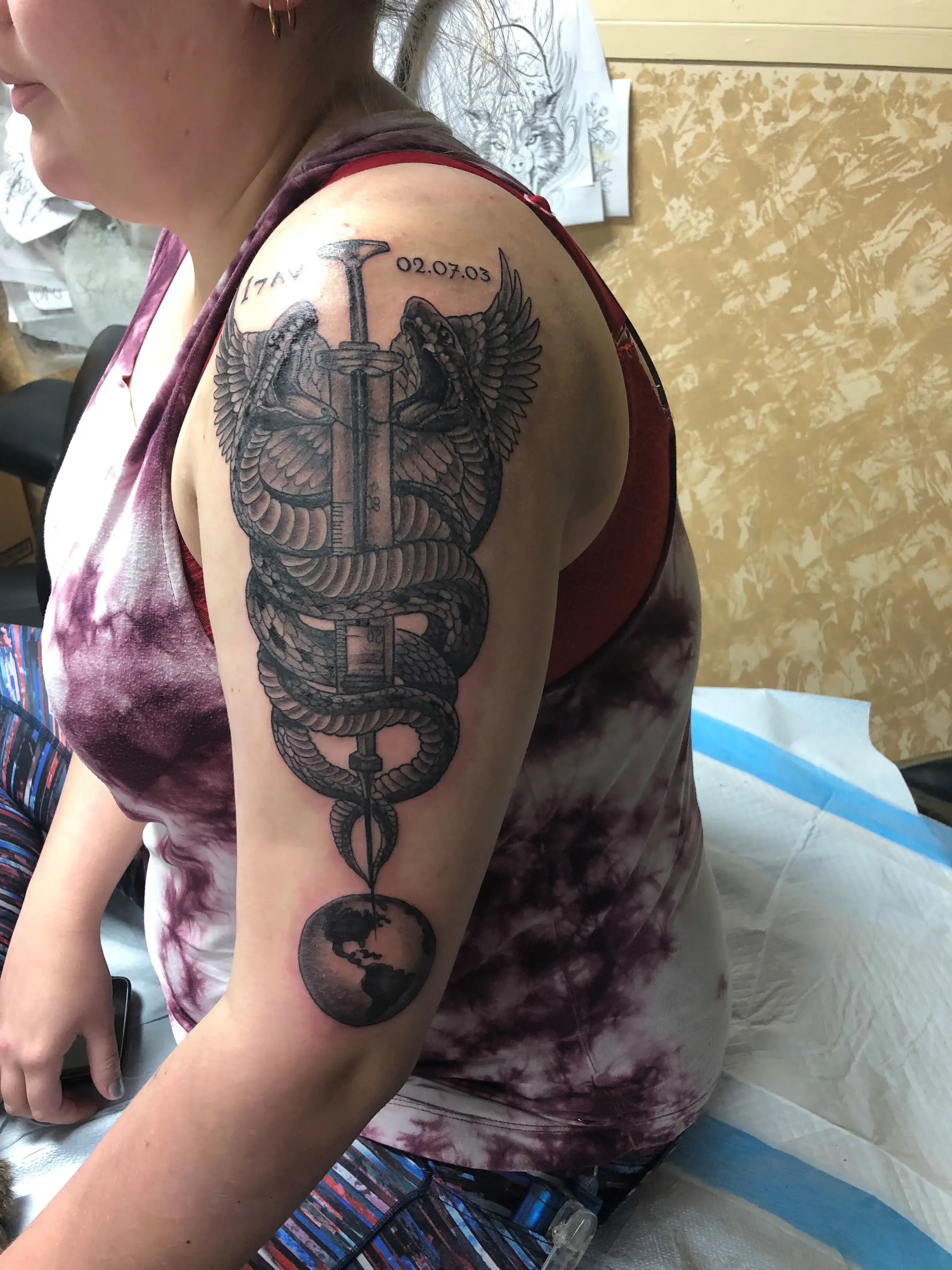 a tattoo on a woman's arm