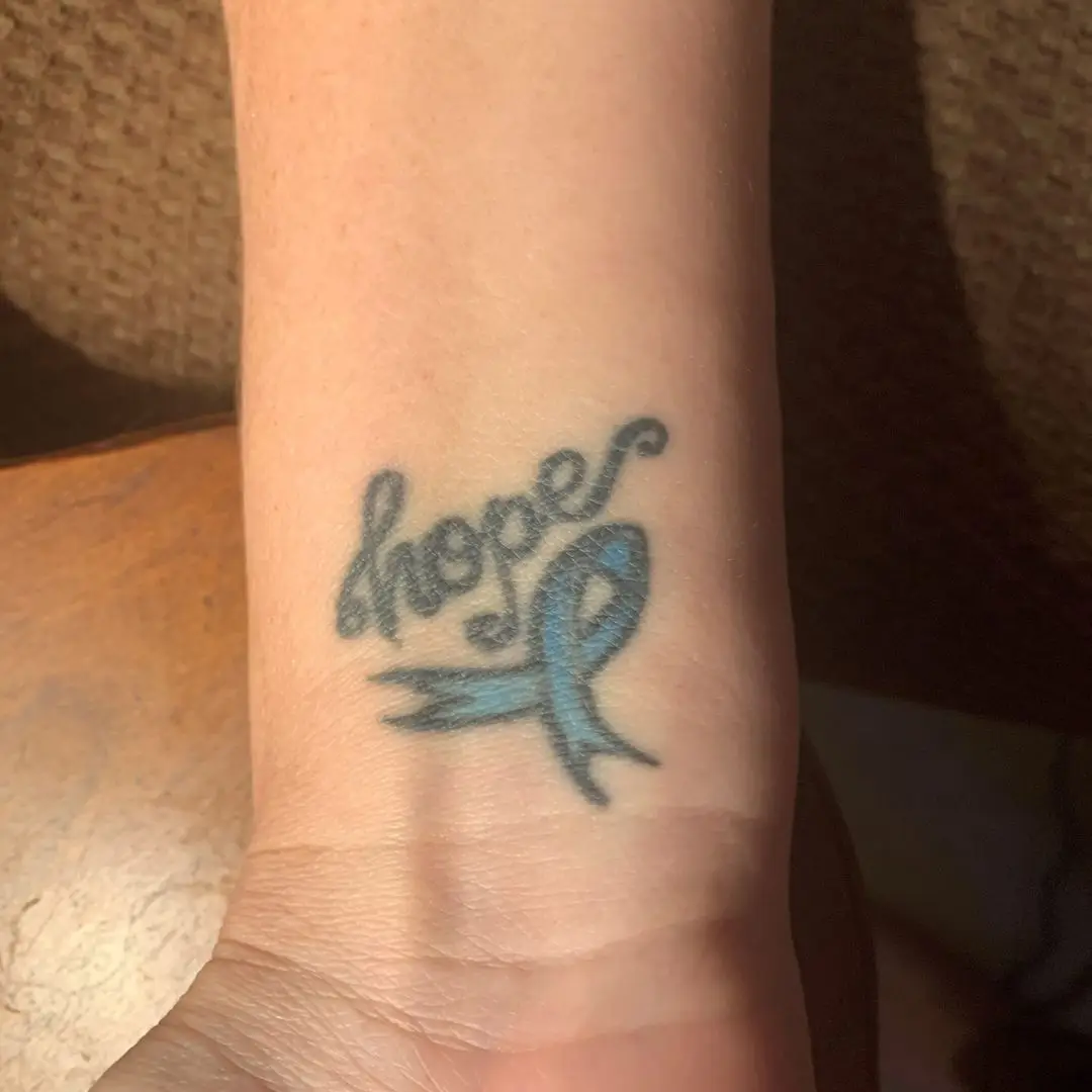 a tattoo on a wrist