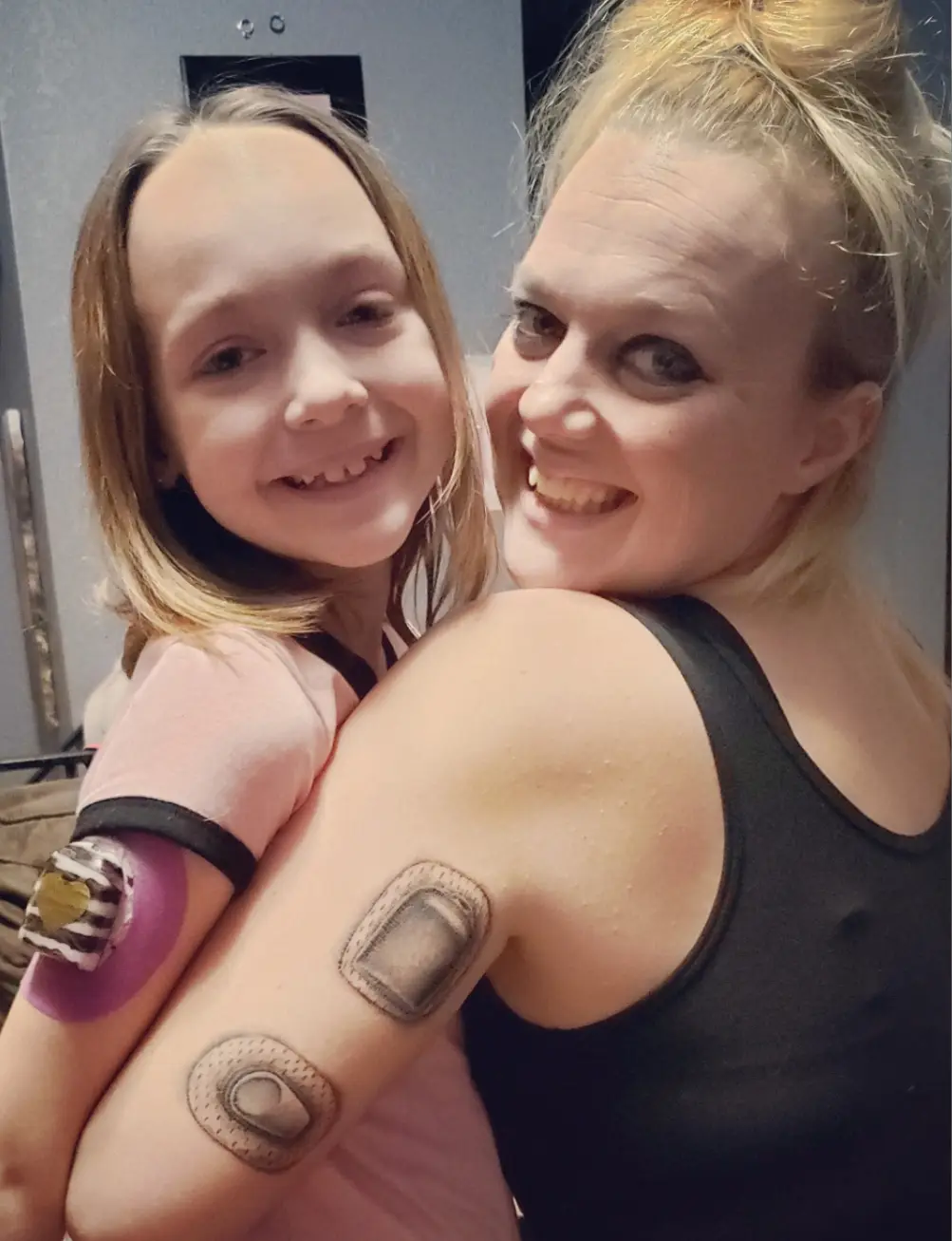 a woman and a girl smiling