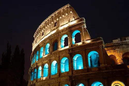 a stone building with blue lights