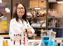 a woman in a lab coat