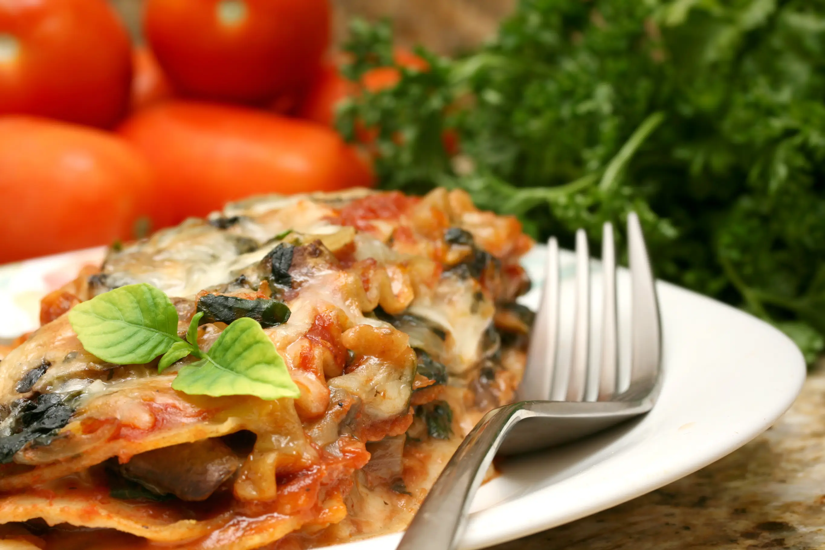 a plate of food with a fork and a fork