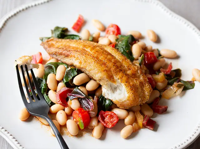 a plate of food with a fork