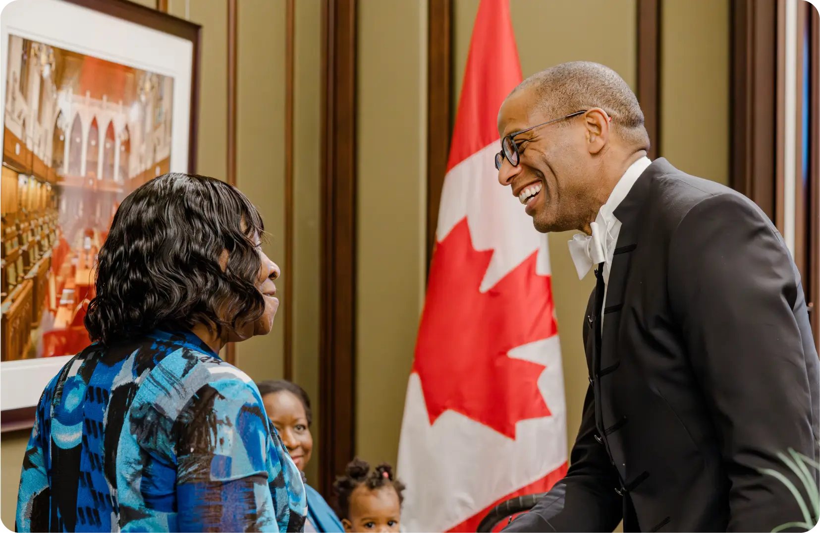 a man and woman smiling at each other