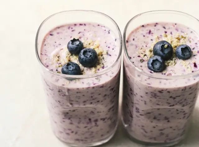 two glasses of blueberry smoothies