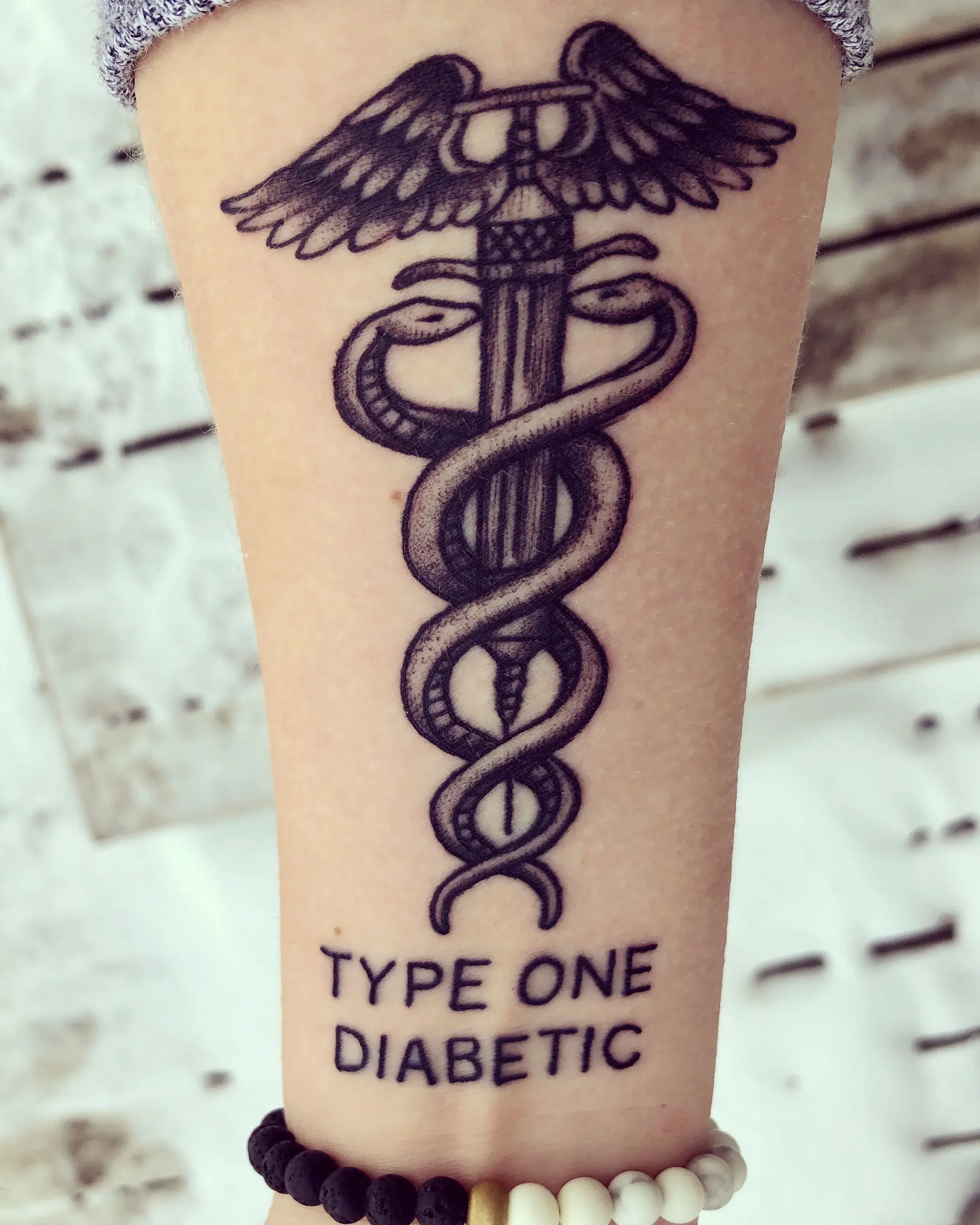 a tattoo on a person's arm