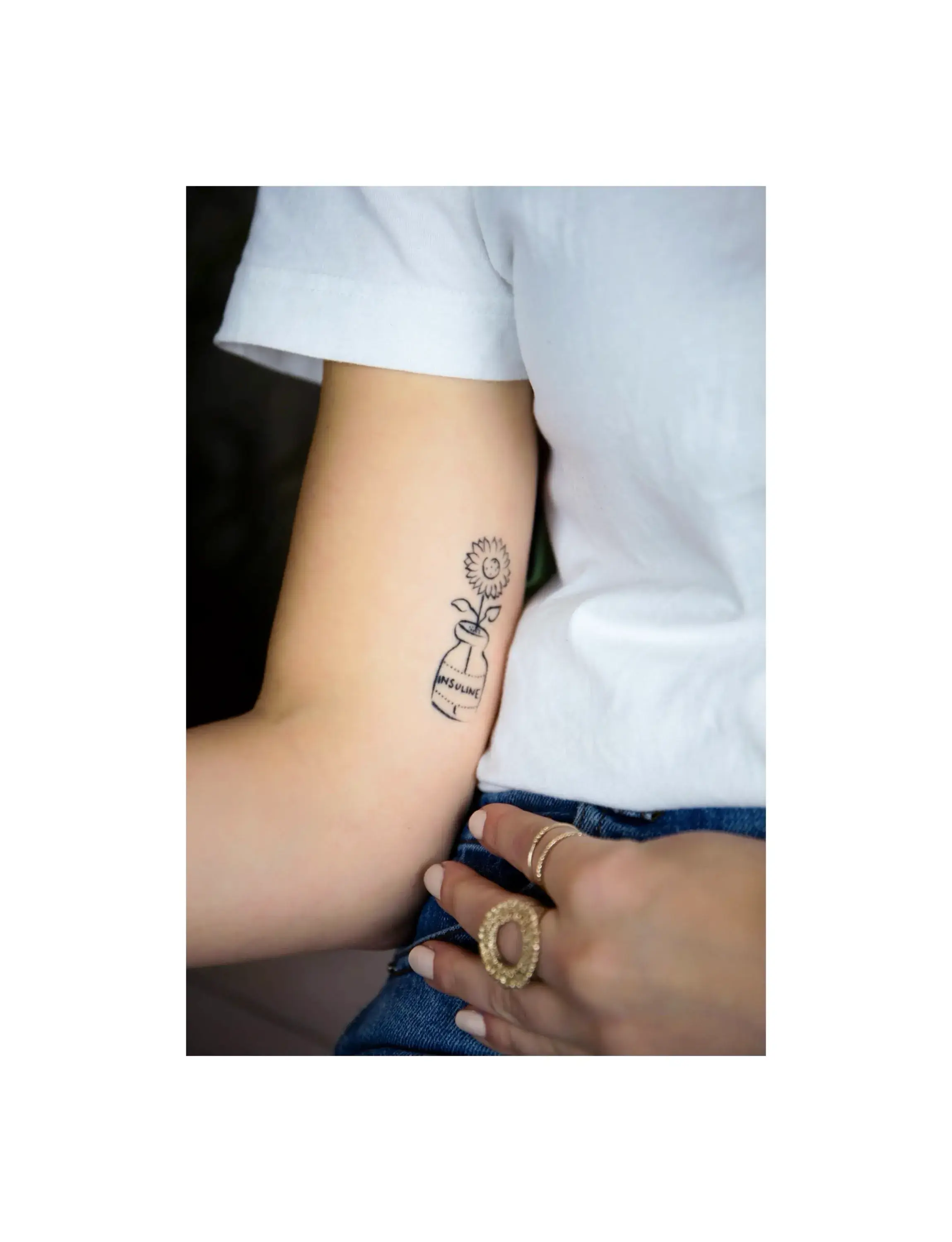 a person's arm with a tattoo