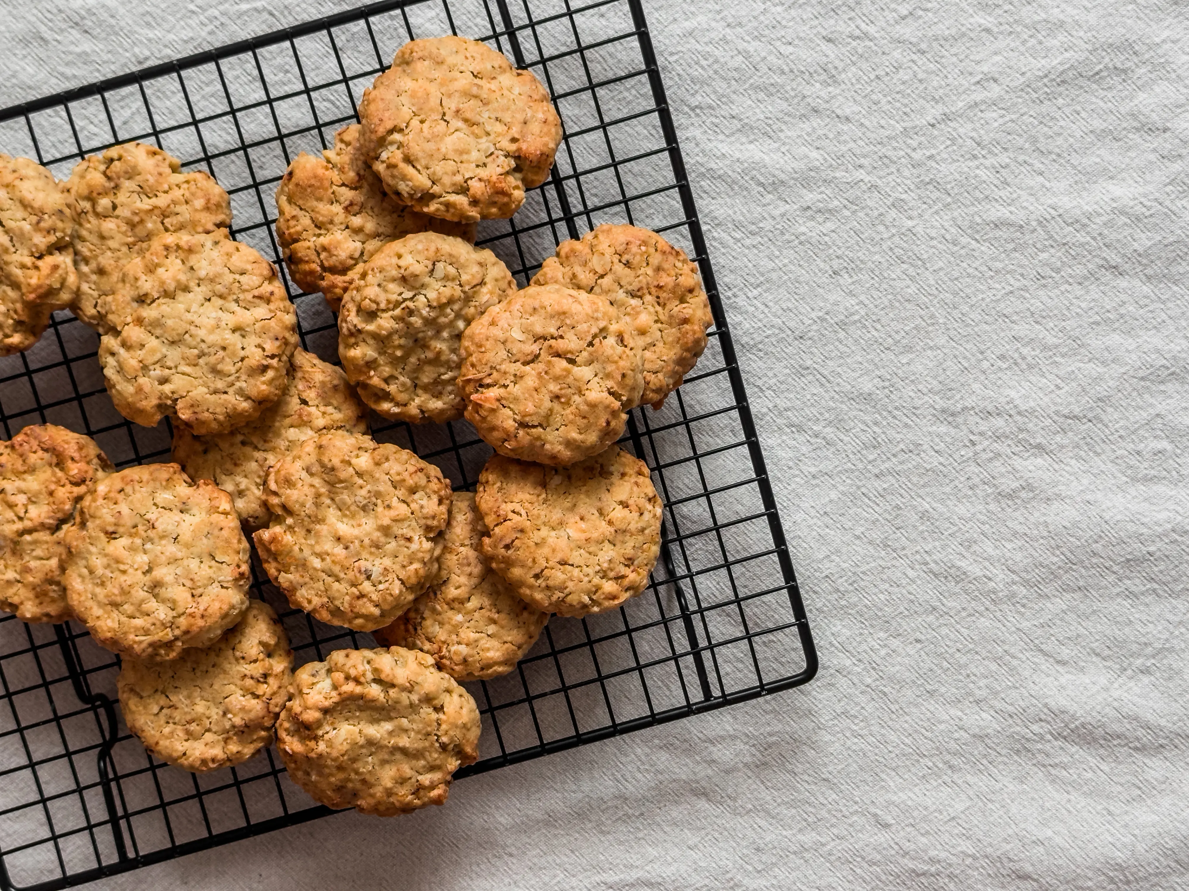 a group of cookies on a cooling rack