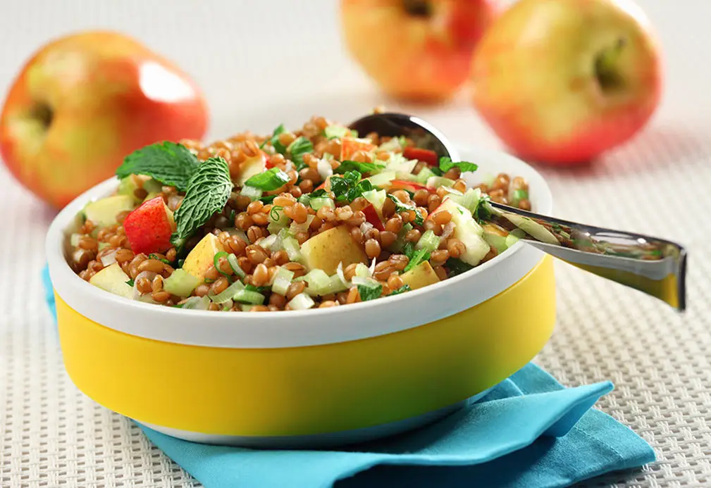 a bowl of food with a spoon