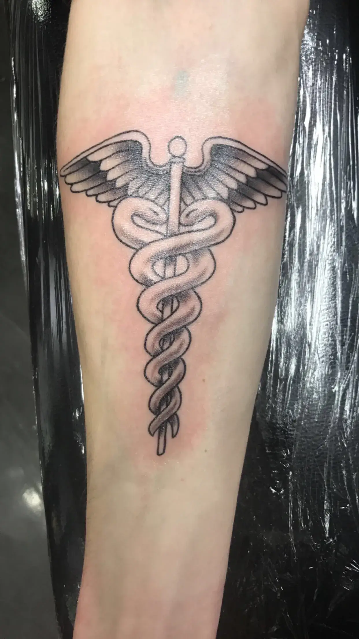 a tattoo on a person's arm
