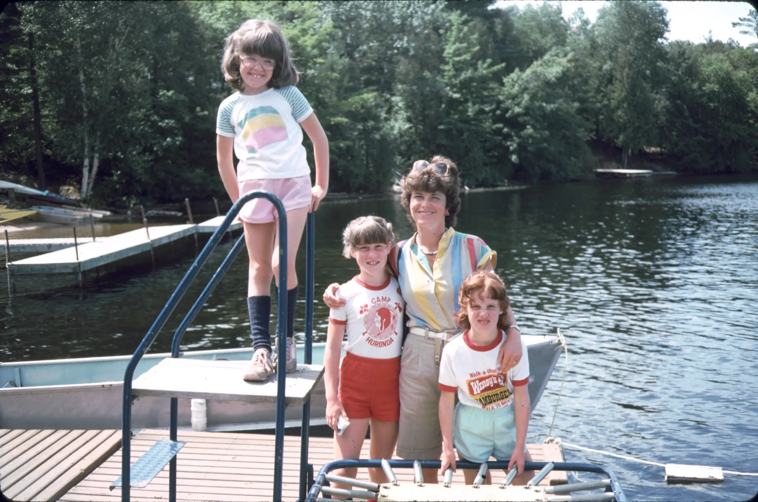 a woman and children on a boat