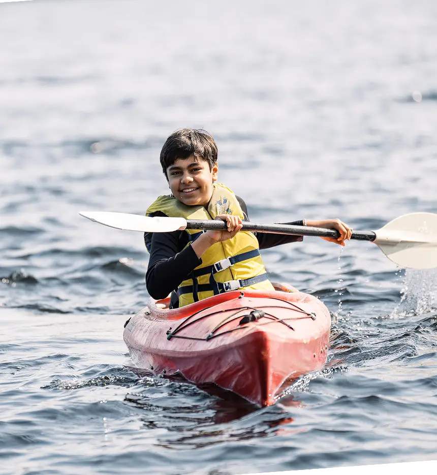 a boy in a kayak