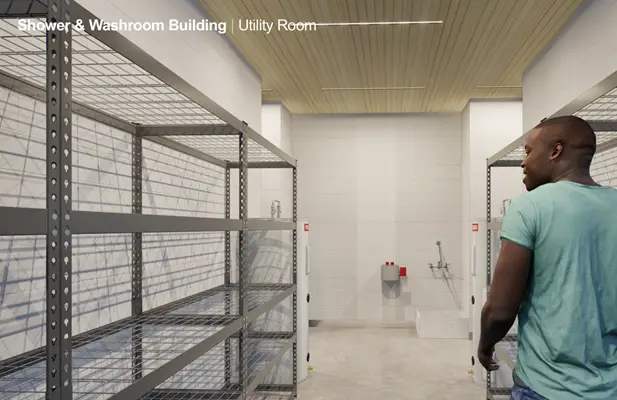 a man standing in a room with metal shelves
