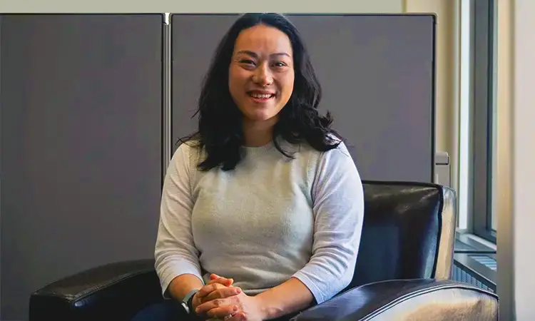 a woman sitting in a chair