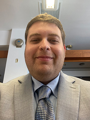 a man wearing a suit and tie